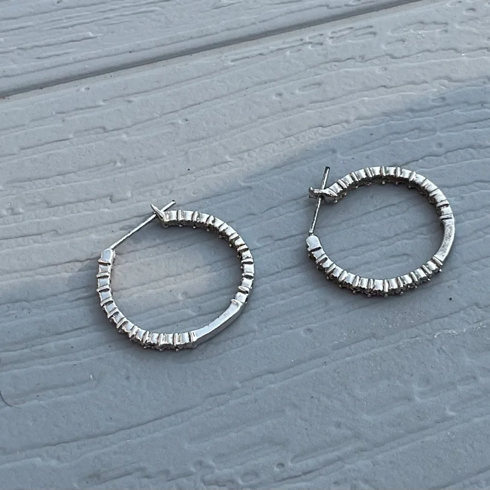 None hoop earrings